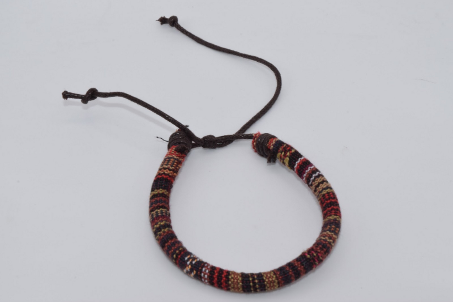 Red Black Tan & Rust Colored Fabric Bracelet